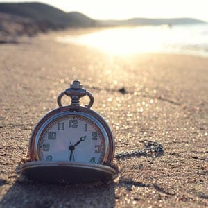 pocket watch in the sand